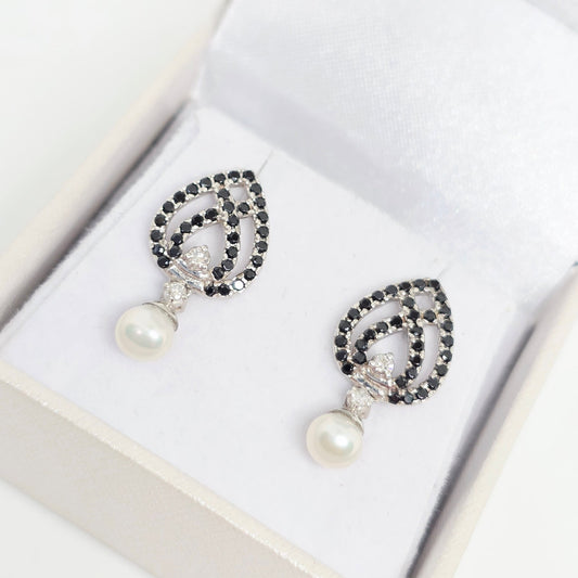 עגילי פנינה בשילוב אבנים שחורות